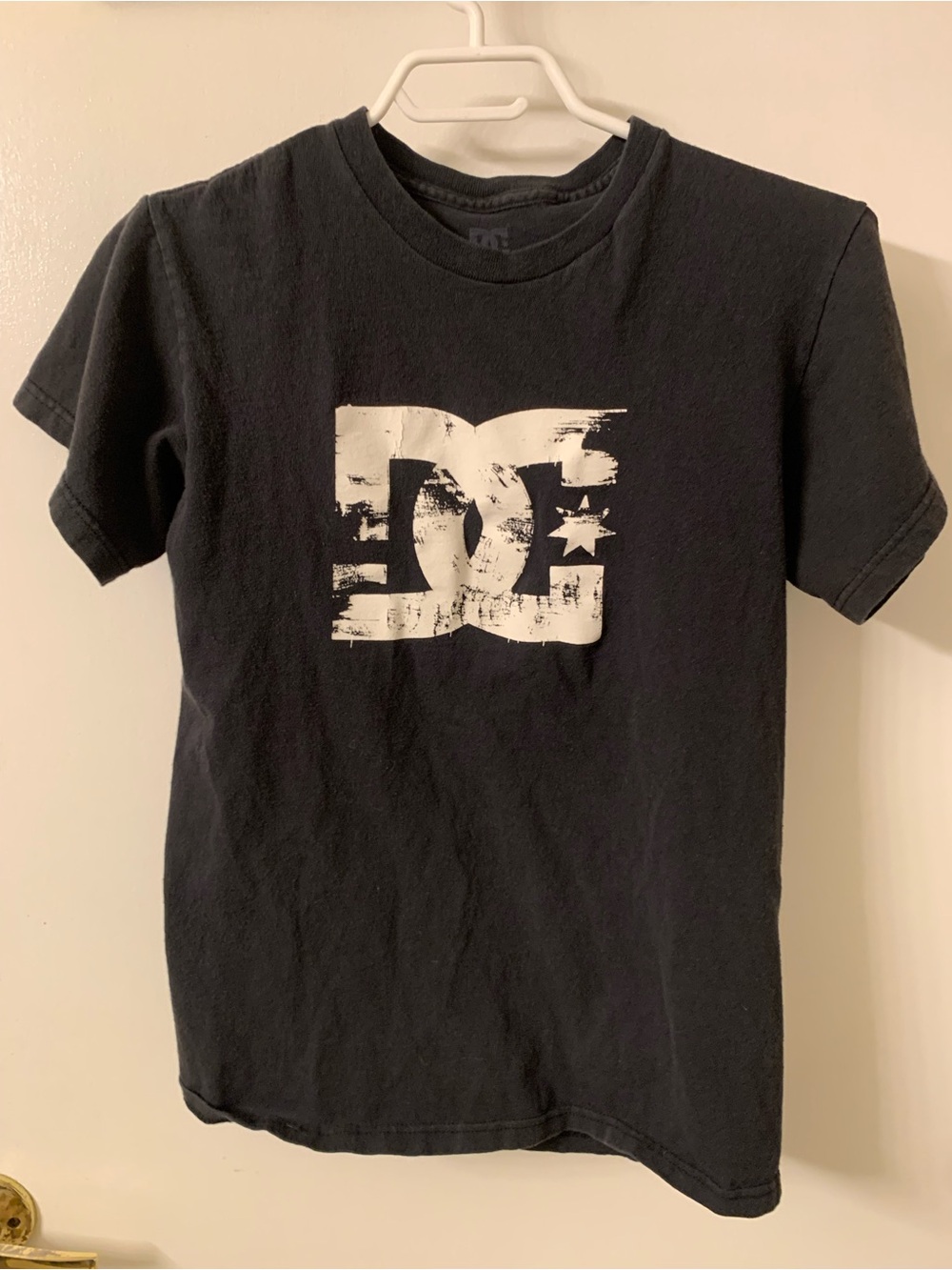 DC Black Tee with Distressed White Logo